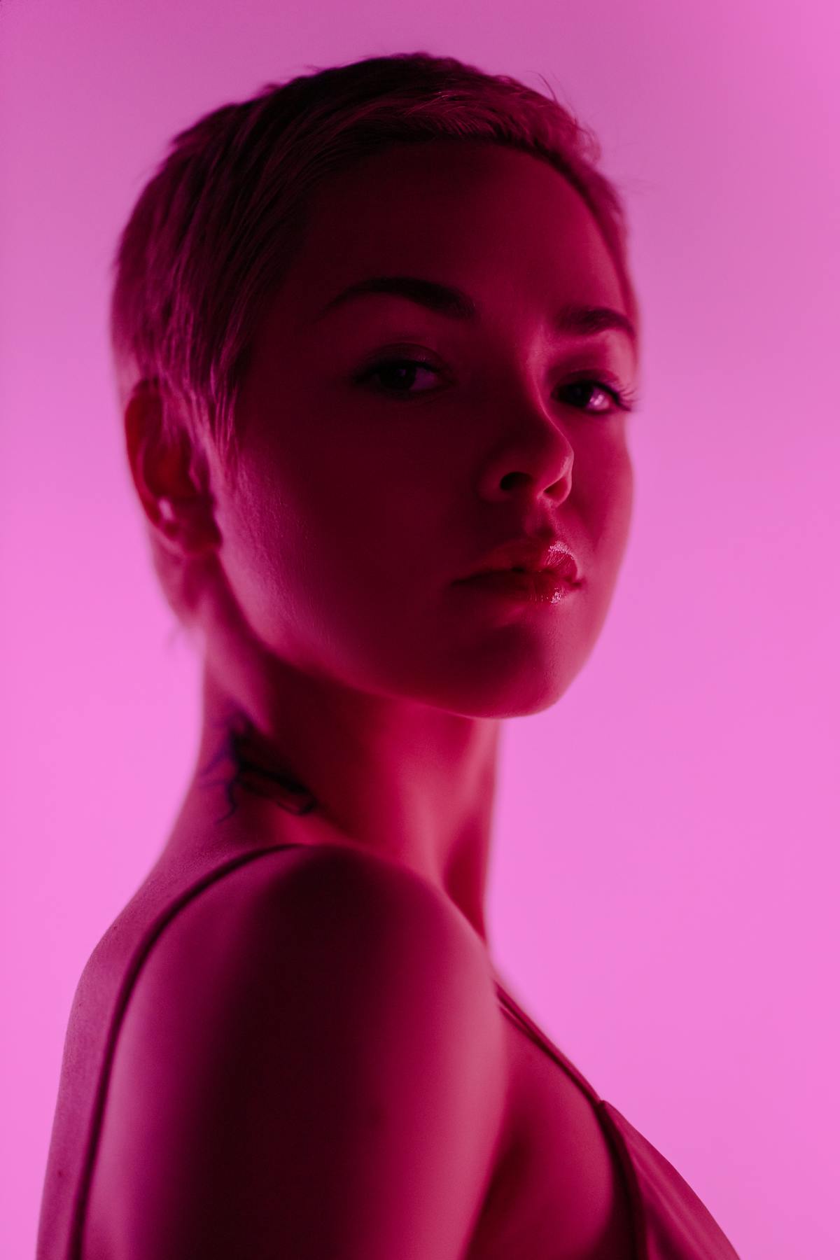 Editorial portrait — pink neon pixie