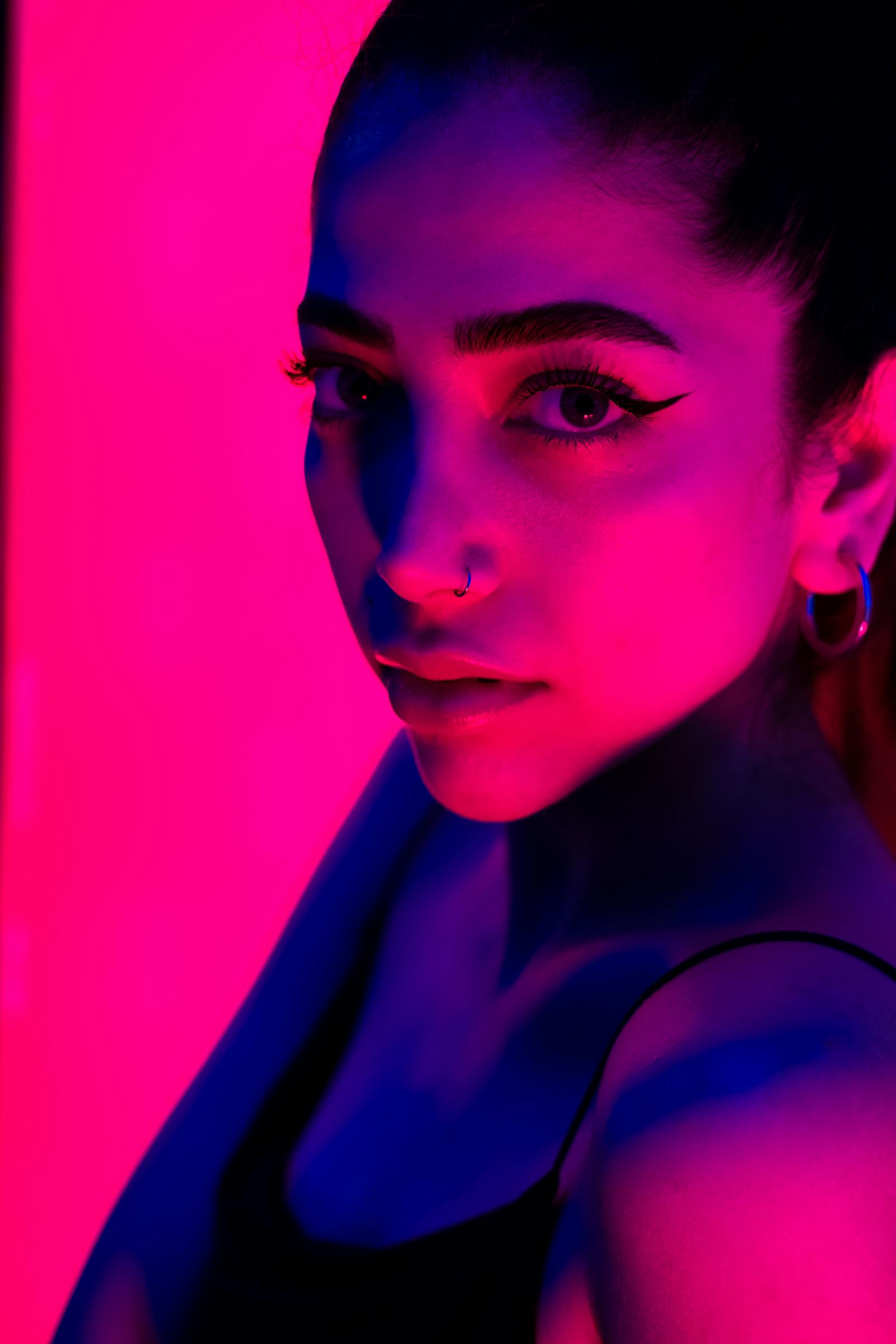 Cover model — neon-lit editorial portrait